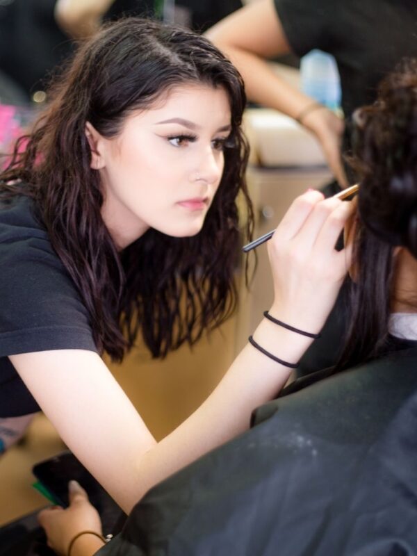 SSA student applying makeup